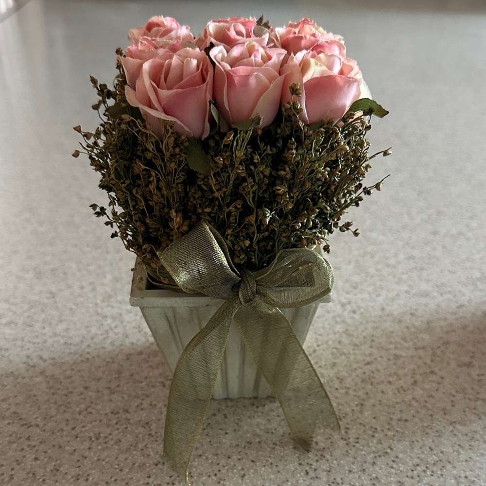 Decorative Floral Arrangement Pink Roses in a green planter box